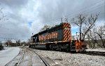 WE 7009 heads east 4 miles to the yard.